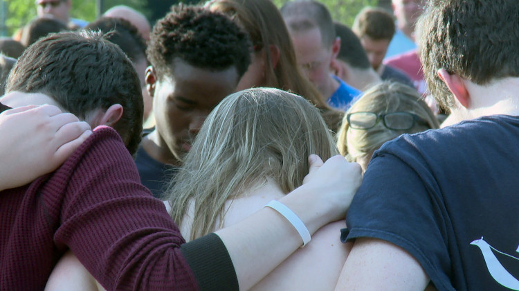 Noblesville students embrace for a community prayer during the vigil. (Lauren Chapman/IPB News)