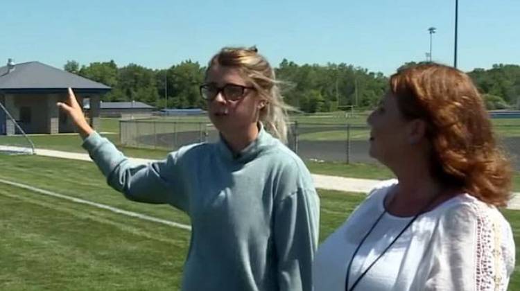 Nicole Klee, left, a junior at Franklin Central High School in Indianapolis, plays soccer, participates in student council and takes several advanced placement classes. She says she doesn't have time to work a part-time job. - James Vavrek/WTIU