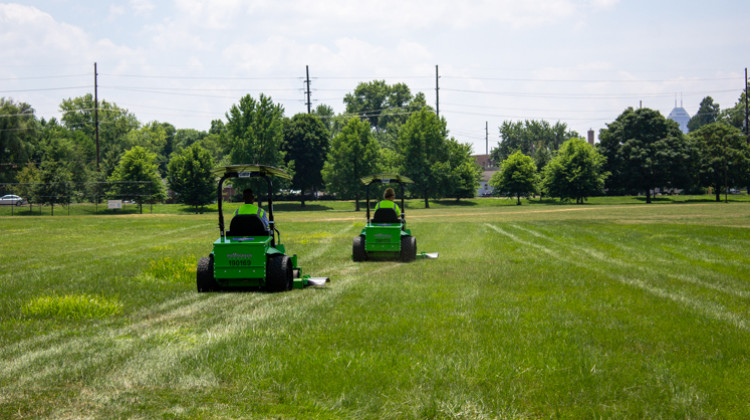Indianapolis unveiled two solar powered lawnmowers as part of Mayor Joe Hogsett’s plan to achieve carbon neutrality by the year 2050. - Evan Robbins/WFYI