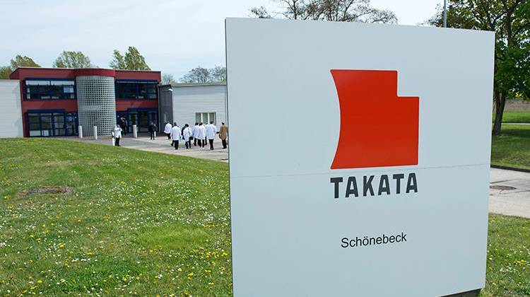 FILE - In this April 17, 2014 file photo, journalists visit a production facility for international automotive supplier Takata Ignition Systems GmbH in Schoenebeck, Germany. - AP Photo/Jens Meyer, File