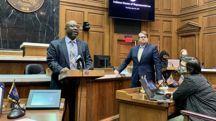 Senate Minority Leader Greg Taylor (D-Indianapolis), at the lectern, and House Minority Leader Phil GiaQuinta (D-Fort Wayne), right, discuss the 2021 legislative session. - Brandon Smith/IPB News