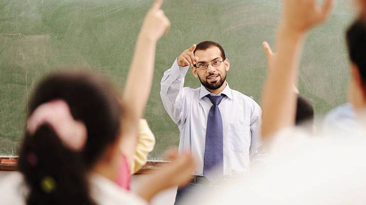 A new bill could change what determines increases in teacher salaries in hopes of retaining teachers. - stock photo