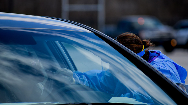 The Indiana State Department of Health conducts drive-thru testing in Merrillville, Indiana, for first-responders and other health care workers.  - Justin Hicks/IPB News