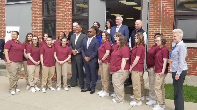 The inaugural class gets a picture with MC Hammer, Gov. Eric Holcomb and others to commemorate the day. - (Samantha Horton/IPB News)