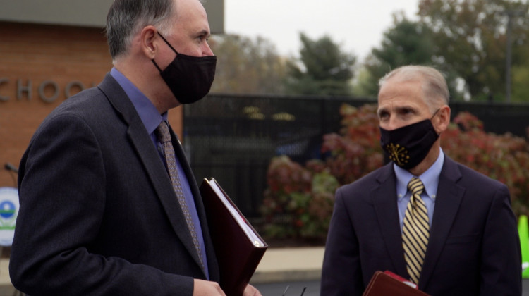 EPA Region 5 Administrator Kurt Thiede (left) and Jim McGoff with the Indiana Finance Authority (right) in front of North Grove Elementary School in Greenwood.  - Alan Mbathi/IPB News