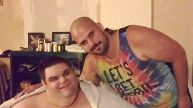 Danny Duncan, left, and his older brother Brandon, right, pose for a picture at their home in Spencer, Indiana. Danny has a severe form of autism, and before the start of the COVID-19 pandemic went to a day program at Stone Belt, a Bloomington nonprofit. - Courtesy of Brandon Duncan