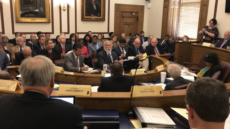 Rep. Tim Brown (R-Crawfordsville), center, presents the controversial Gary-Muncie school takeover bill to a meeting of the Legislative Council. - Brandon Smith/IPB News