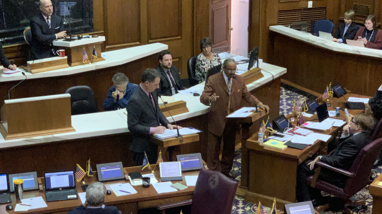 Rep. Todd Huston (R-Fishers) debates the budget bill with Rep. Vernon Smith (D-Gary). - Brandon Smith/IPB News