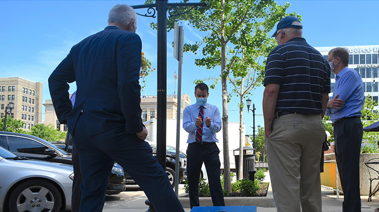 U.S. Sen. Todd Young (R-Ind.) talks to business owners in South Bend before a press conference to promote the RESTART Act bill he co-authored.  - Justin Hicks/IPB News
