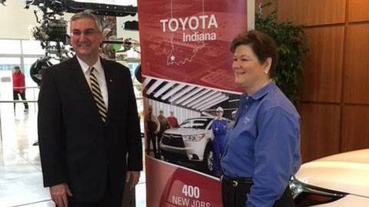 Indiana Gov. Eric Holcomb and TMMI President Millie Marshall were all smiles at Tuesday's announcement.  - John Gibson/WNIN