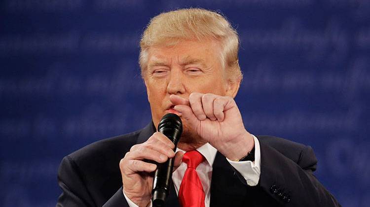 Republican presidential nominee Donald Trump speaks to Democratic presidential nominee Hillary Clinton during the second presidential debate at Washington University in St. Louis, Sunday, Oct. 9, 2016.  - AP Photo/Patrick Semansky