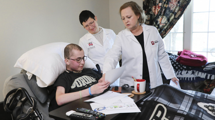 Tyler Trent speaks with Indiana University researchers at his home, one month before his death. - Christine Drury/Indiana University