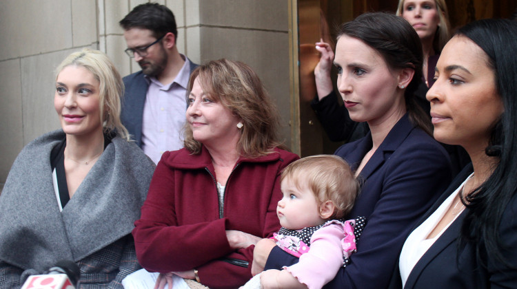 (Left to right) Former gymnasts Sarah Klein, Marcia Frederick, Rachael Denhollander and Tasha Schwikert questioned USA Gymnastics CFO Scott Shollenbarger Thursday during a meeting with creditors. - Samantha Horton/IPB News