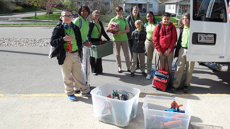 Students from Paramount School of Excellence prepare to load their robots for a trip to the VEX Robotics World Championship. - Jill Sheridan