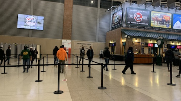 Voters begin to file into Bankers Life Fieldhouse to cast their vote on election day. - Robert Moscato-Goodpaster/WFYI