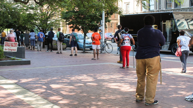 Voters try to maintain social distance as they wait in line at the Indianapolis City-County building on primary election day. -  Lauren Chapman/IPB News