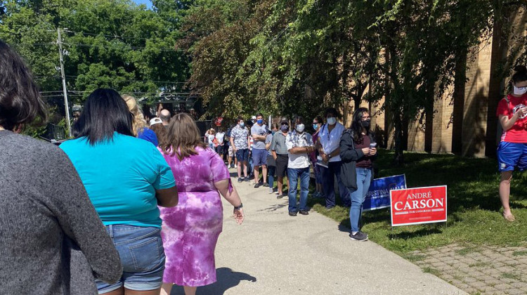 Voters stand in line waiting to vote outside of the Broad Ripple High School building. - Darian Benson/Side Effects Public Media