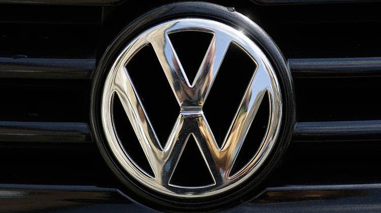 The brand logo of German car maker Volkswagen, VW, is photographed on a car in Berlin, Tuesday, Aug. 1, 2017. - AP Photo/Markus Schreiber