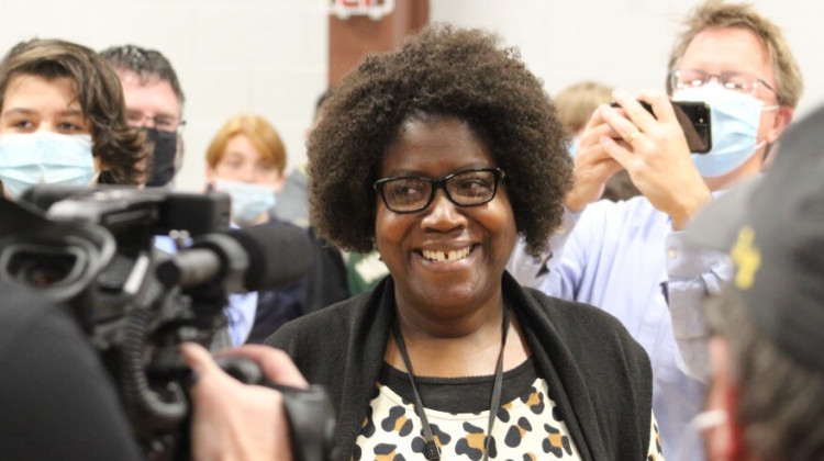 Mrs. Sharita Ware walks through a crowd of reporters and students during surprised announcement of her Teacher of the Year award. - Ben Thorp/WBAA