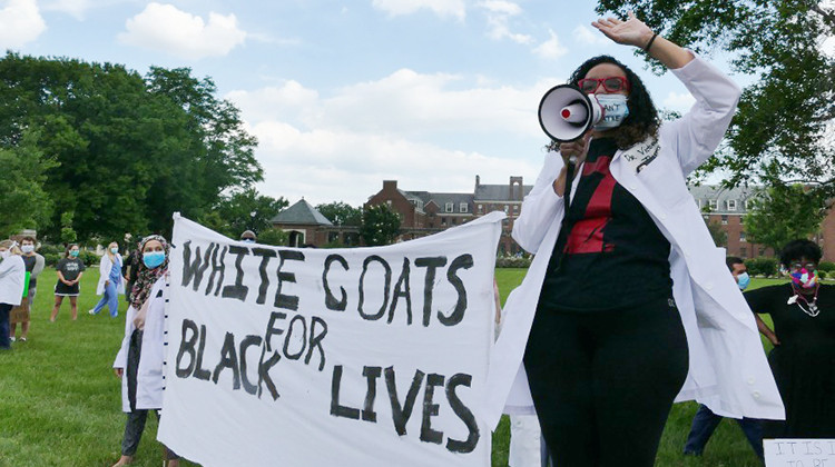 Dr. Victoria Thomas organized a White Coats for Black Lives march in June to bring awareness to racial disparities in the medical community. - Carter Barrett/Side Effects Public Media