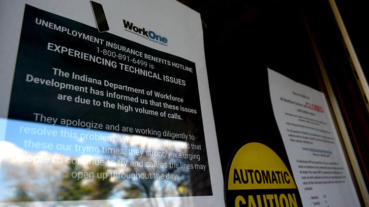 A sign informs visitors that while WorkOne employment offices are closed, the Department of Workforce Development is experiencing technical issues due to high call volumes.  - Justin Hicks/IPB News