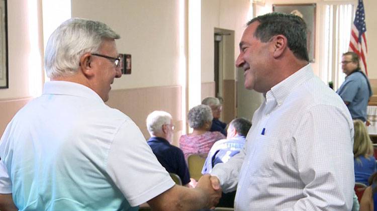 Sen. Joe Donnely (D-Ind.) greets a constituent at a campaign kick-off event for re-election in 2018. - WTIU/WFIU