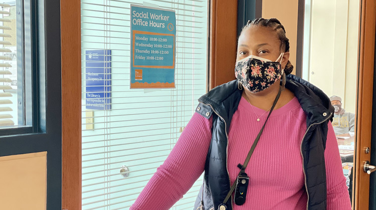 The Indianapolis Public Library hired Yanna McGraw as its first full-time social worker in July. Her job is to help library patrons navigate challenges beyond the scope of what librarians are trained to handle. - (Darian Benson/Side Effects Public Media)