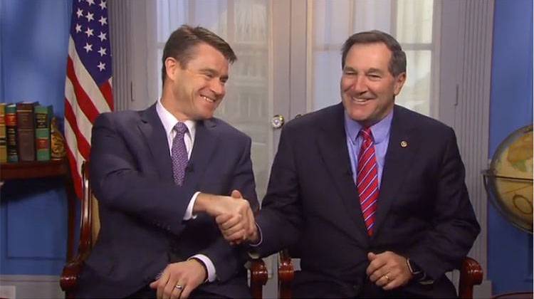 Senators Todd Young and Joe Donnelly shake hands at the end of a video announcing that the federal government will now officially refer to Indiana residents as "Hoosiers."