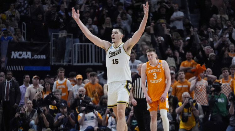 Purdue center Zach Edey (15) reacts near Tennessee guard Dalton Knecht (3) after the team defeated Tennessee in an Elite Eight college basketball game in the NCAA Tournament, Sunday, March 31, 2024, in Detroit. - Paul Sancya / AP Photo