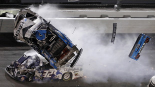 Ryan Newman (6) goes airborne after crashing into Corey LaJoie (32) during the NASCAR Daytona 500 auto race Monday, Feb. 17, 2020, at Daytona International Speedway in Daytona Beach, Fla. Sunday's running of the race was postponed by rain. - AP Photo/Chris O'Meara