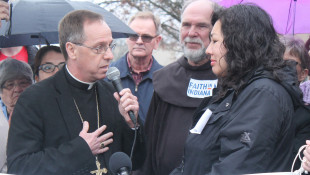 Faith Leaders Host Vigil, Protest Immigration Crack-Down