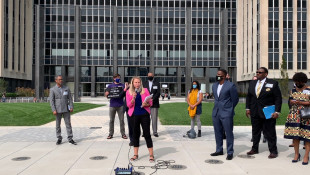 Representatives from Faith in Indiana gathered at the City-Council Building in Indianapolis Monday to voice support for a new proposal that would update governance of the city's police department. - Robert Moscato-Goodpaster/WFYI