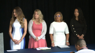 Niki DaSilva, Gabrielle Brock, Rep. Mara Candelaria Reardon (D-Munster) and Samantha Lozano say Attorney General Curtis Hill sexually harassed them. - Brandon Smith/IPB News