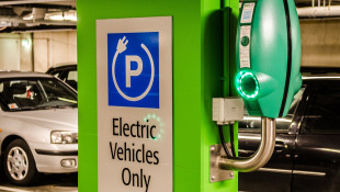 Indiana is adding electric vehicle charging stations, but makes EV owners pay a fee. Why?