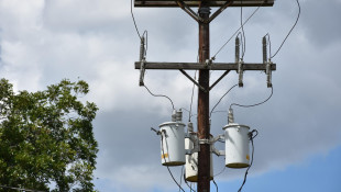 AES reaches tentative settlement over price hike proposal
