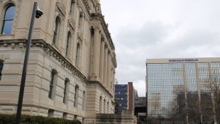 Dozens of state employees laid off as budget cuts hit agencies