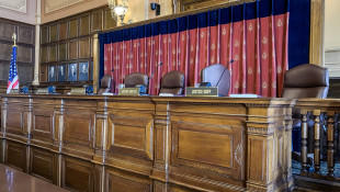 DNR officer wants state to foot the bill after he lied and got a woman falsely charged