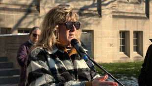 Suspended IU prof returns to class — with university observers