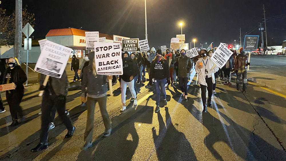 Dozens Of Protesters Gather At Lafayette Square