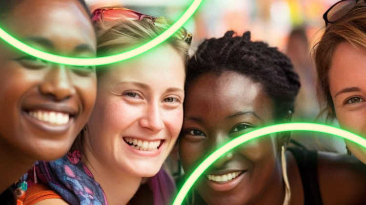 four women smiling