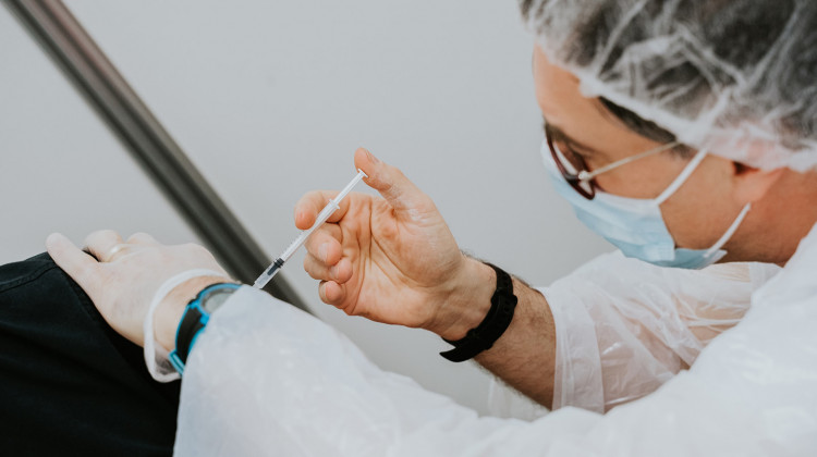 Mat Napo/Unsplash Vaccine Hesitancy and Access Issues