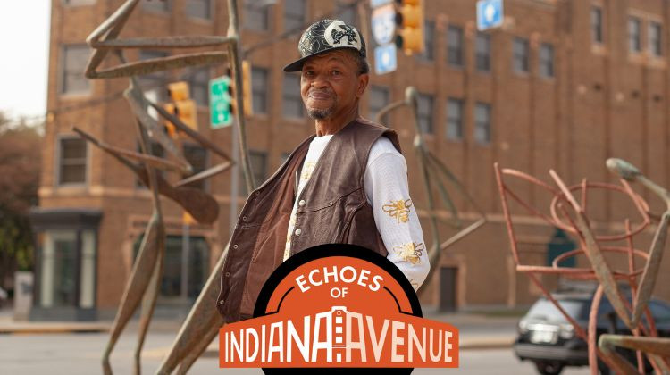 Echoes of Indiana Avenue host Herman Butch Slaughter stands on Indiana Avenue in front of the Madam Walker Theatre. - Jes Nijjer Xmas at the Sunset Terrace