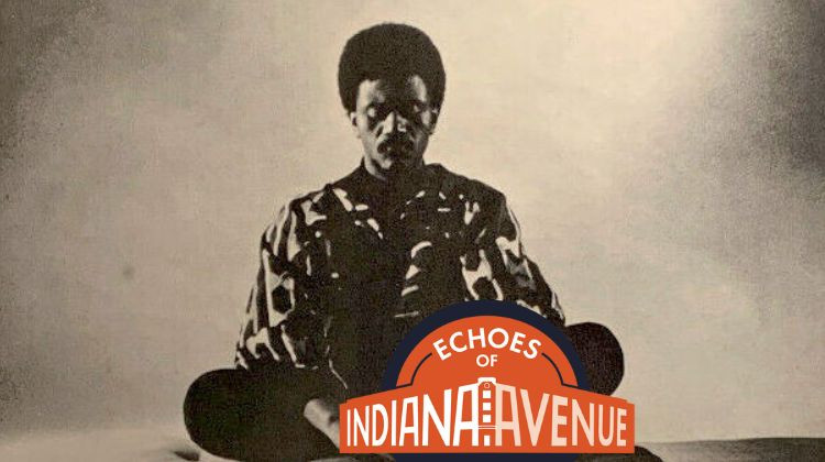 Pharoah Sanders sits in a meditative pose on top of pillows. Pharoah Sanders and the Jazz Masters of Indiana Avenue
